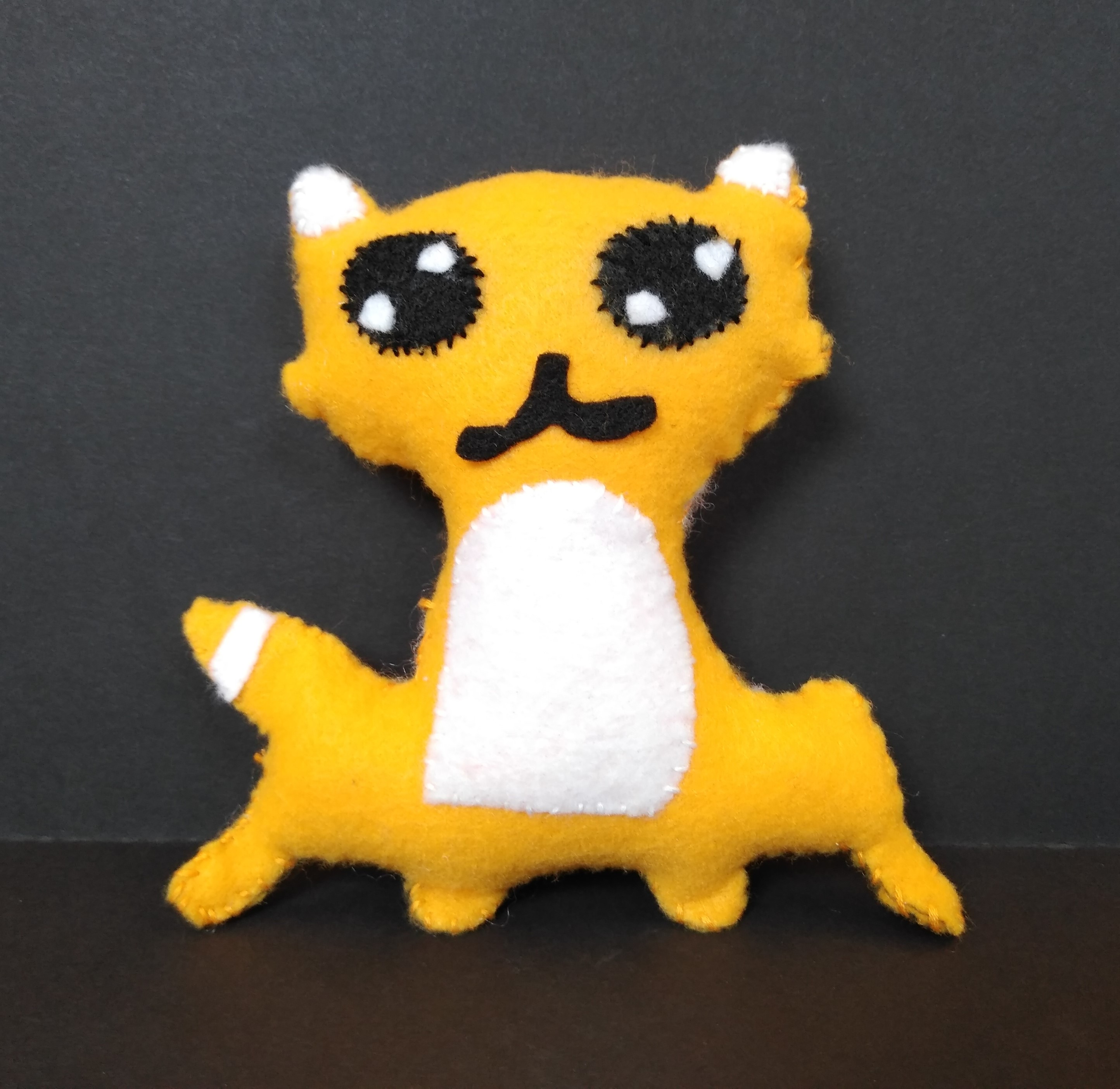 "Foxy" Joshua Yang Felt, embroidery floss, and Poly-Fil 5th Barrie NFS